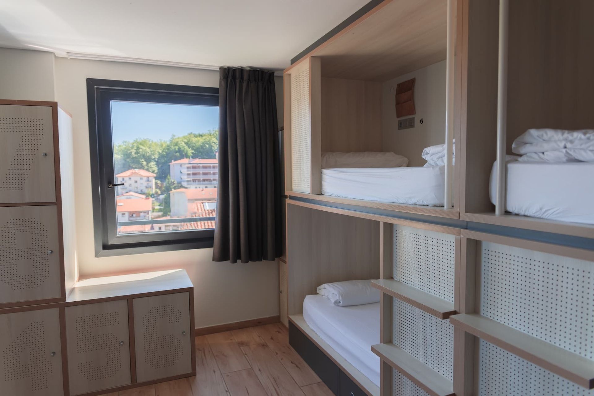 Bed in a shared 8-bed room with private bathroom 